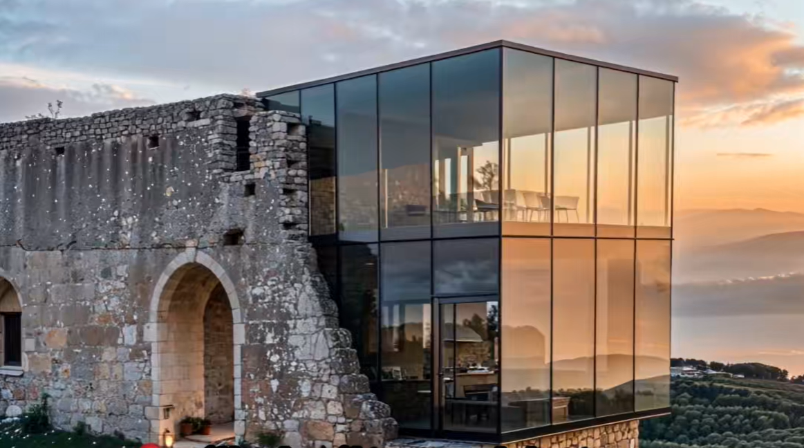 Renovated building showcasing a blend of historical brick and modern glass features